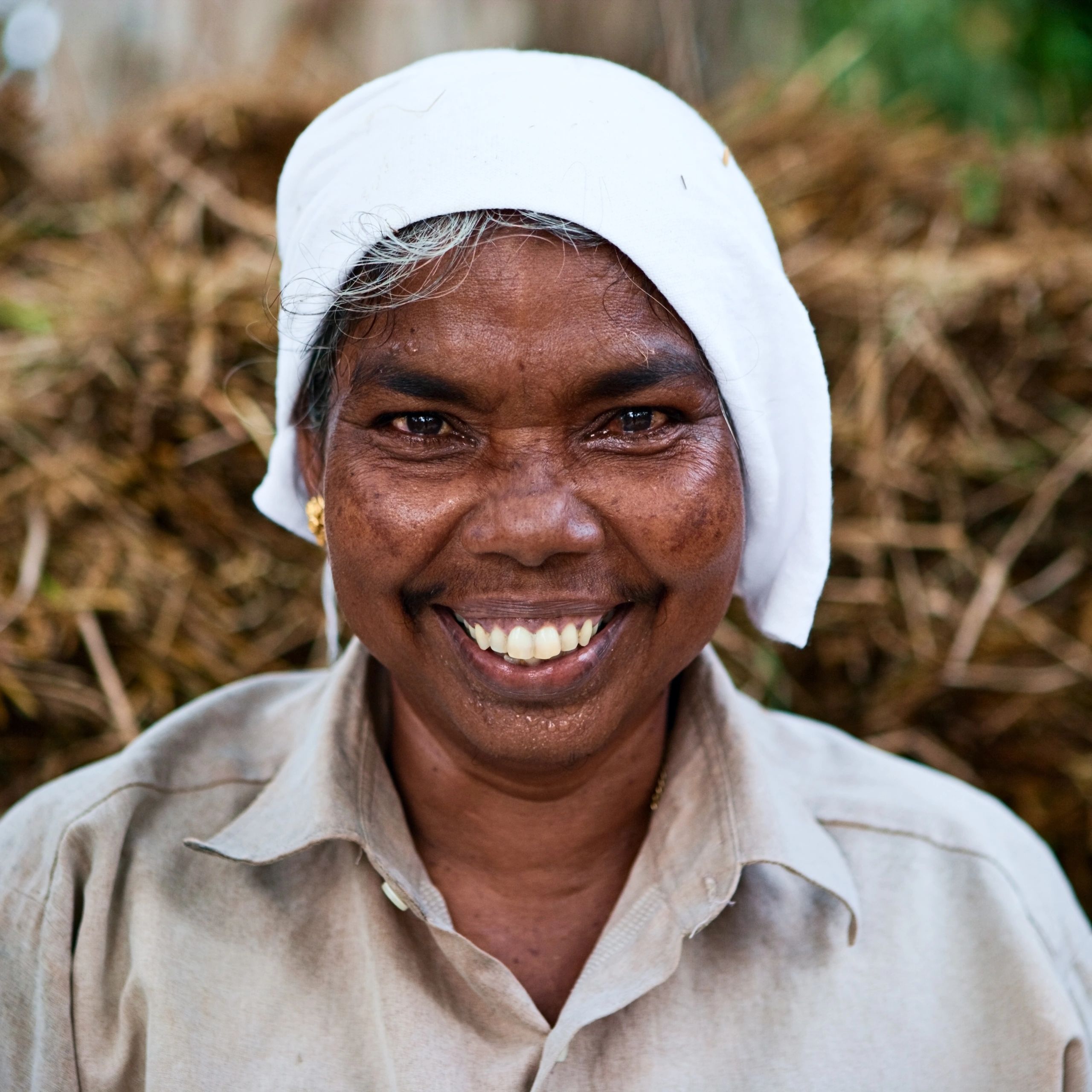 Indian woman working in a rural agricultural setting