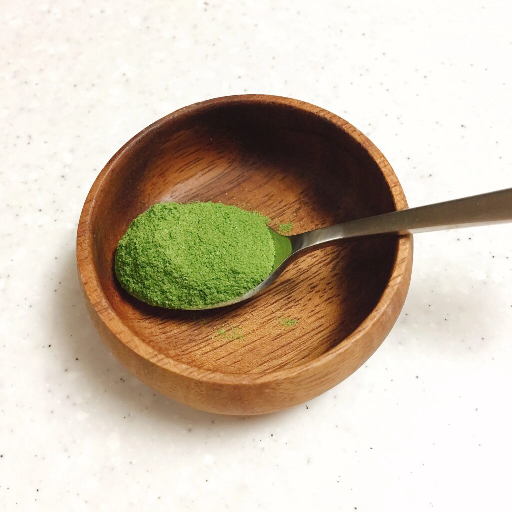 A spoon of Organic Matcha Green tea powder from Japan